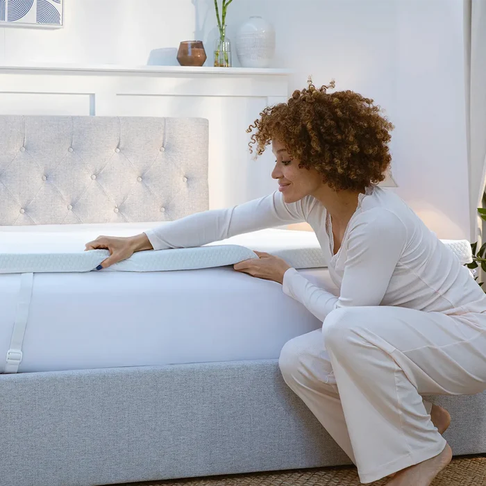 [MattressTopper] Woman setting up a Panda Bamboo Mattress Topper