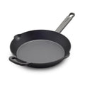 The Bobby Flay by GreenPan 10" Cast Iron Frypan, shown in black with a long handle and small helper handle, features two pouring spouts and a spacious cooking surface ideal for everyday use.