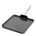 Black ceramic square griddle with metal handle, shown on a white background.