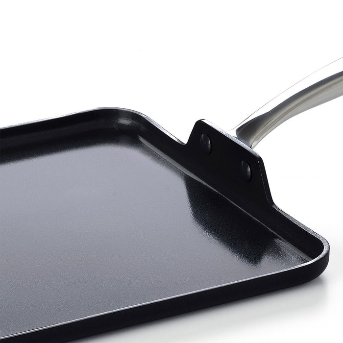 Black ceramic nonstick 11-inch square griddle with metal handle on a white background.