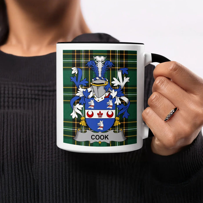 Cook heritage mug featuring the family crest, black handle and tartan design.
