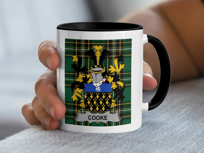 Cooke Irish surname mug with family crest on an Irish National Tartan background.