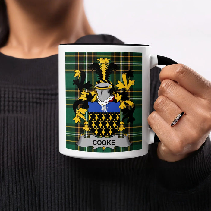 Cooke heritage mug featuring the family crest, black handle and tartan design.