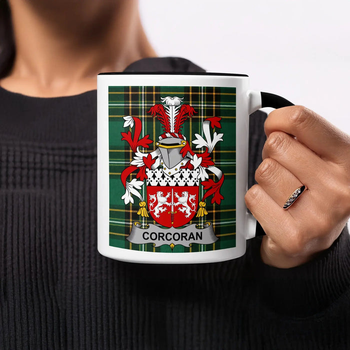 Corcoran heritage mug featuring the family crest, black handle and tartan design.