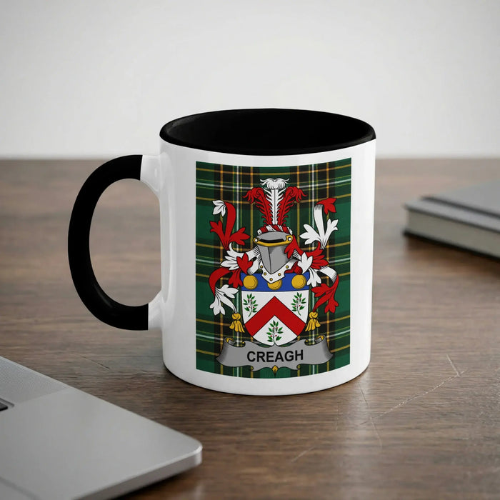 Creagh white ceramic surname mug with a black handle and interior