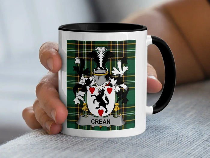 Crean Irish family crest accent mug with a black rim and handle