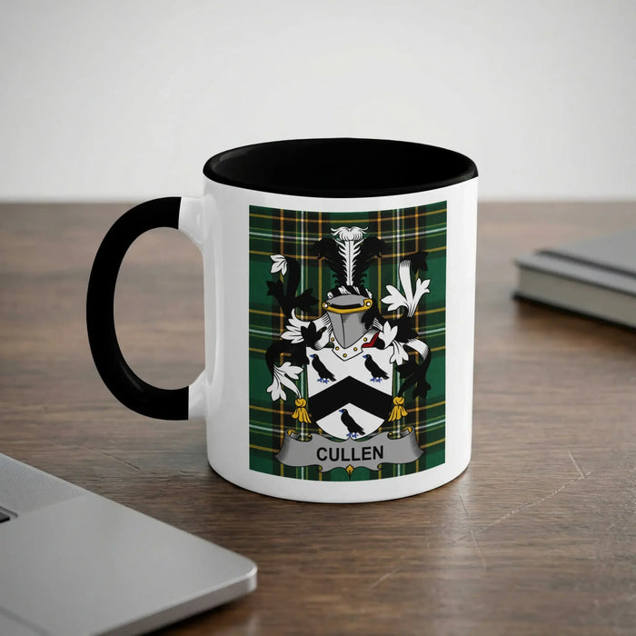White mug with black rim featuring the Cullen family crest.