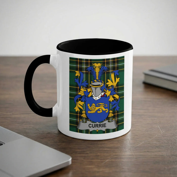 White mug with black rim featuring the CURRIE family crest.