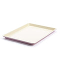 Pink ceramic cookie sheet, 18 x 13, on a white background.