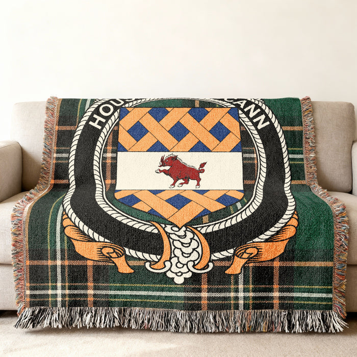 House of MacCann woven blanket displayed on a sofa