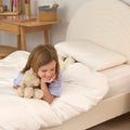 [FSKidsW] Girl smiling with teddy bear on a Kids Bamboo Bedding Set White