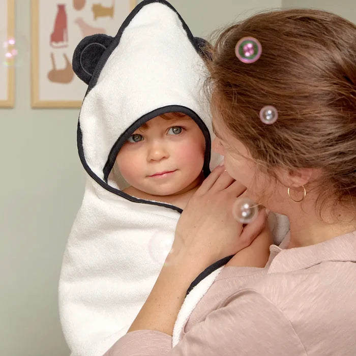 [all] Mother holding baby wrapped in a Kids Bamboo Hooded Towel