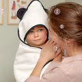 [all] Mother holding baby wrapped in a Kids Bamboo Hooded Towel