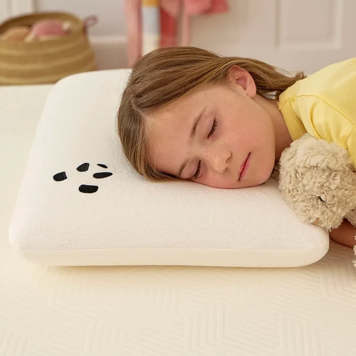 Girl sleeping on a kids panda london pillow