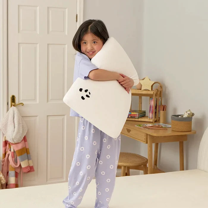 Girl hugging a kids bamboo panda london pillow