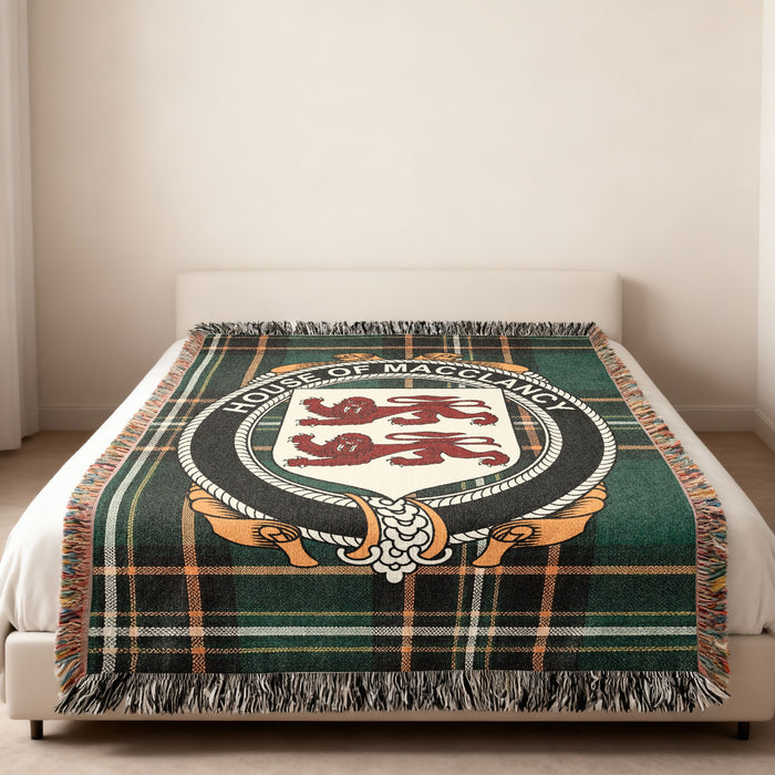 MacClancy family crest emblem woven blanket displayed on a bed