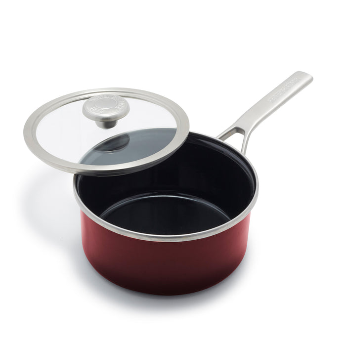 Chocolate brown 2-quart saucepan with lid, metal handle, and smooth finish, shown on a plain background.