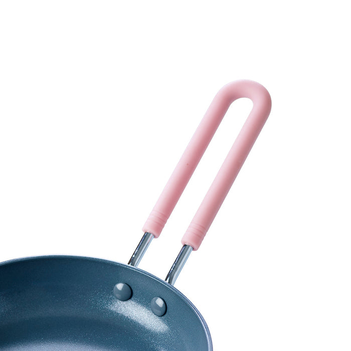 Pink ceramic 5-inch nonstick frypan on a white background.