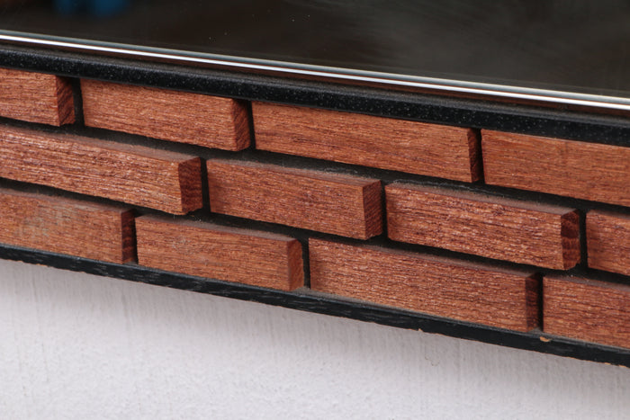 Oblong wall mirror with block pattern