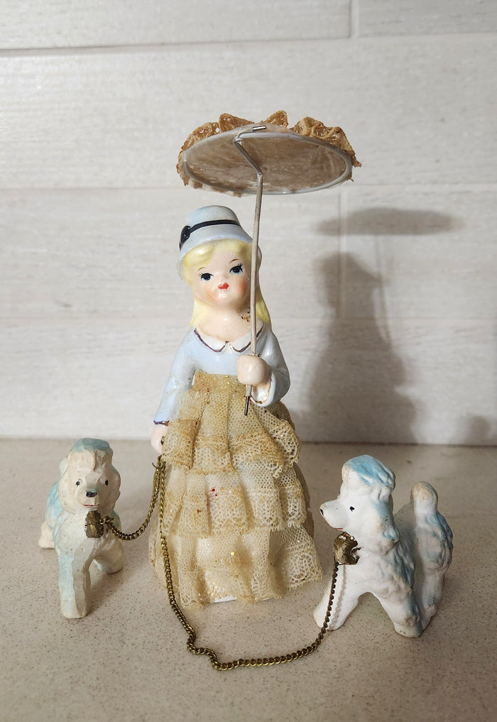Porcelain Lady Walking Poodles with Umbrella Figurine