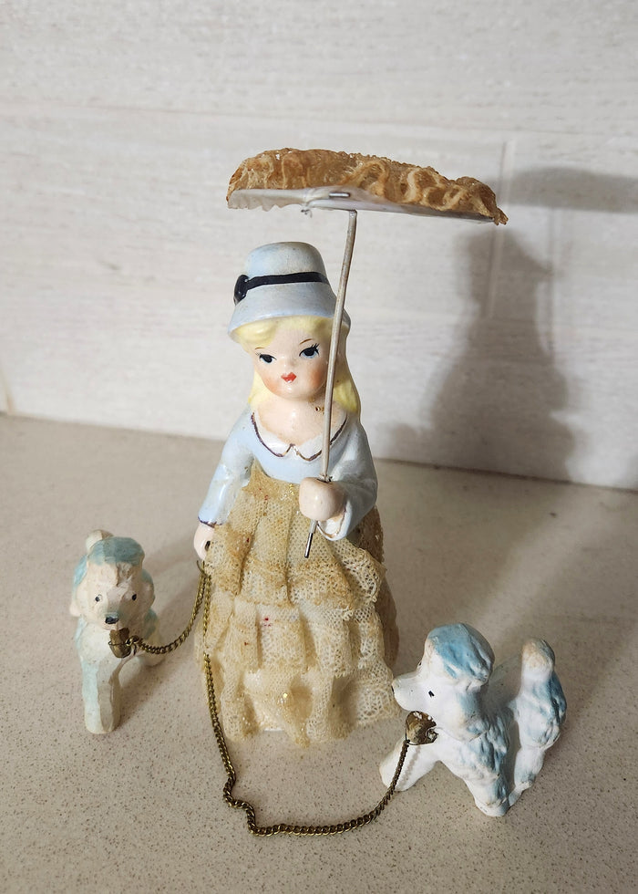 Porcelain Lady Walking Poodles with Umbrella Figurine
