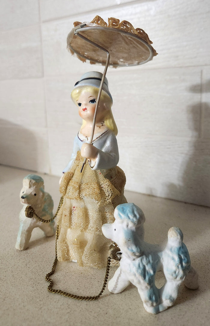 Porcelain Lady Walking Poodles with Umbrella Figurine