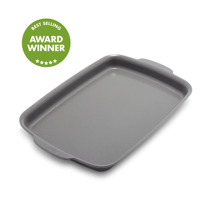Gray ceramic nonstick 13x9 inch quarter sheet pan with handles, angled view, Best Selling Award Winner badge shown.