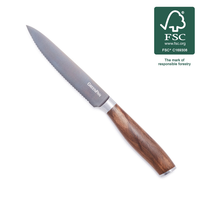 Serrated utility knife with titanium blade, walnut handle, visible GREENPAN branding, next to FSC-certified forestry logo.