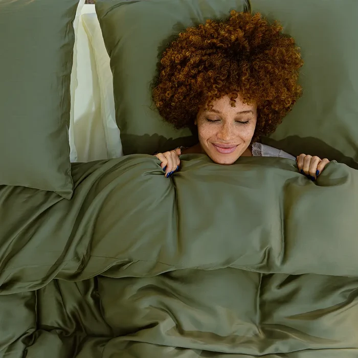 [ForestGreen] Girl sleeping on a SIgnature_Bedding_Set_Forest_Green