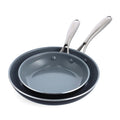 Two ceramic nonstick frypans with metal handles, one 8-inch and one 10-inch, stacked on a white background.