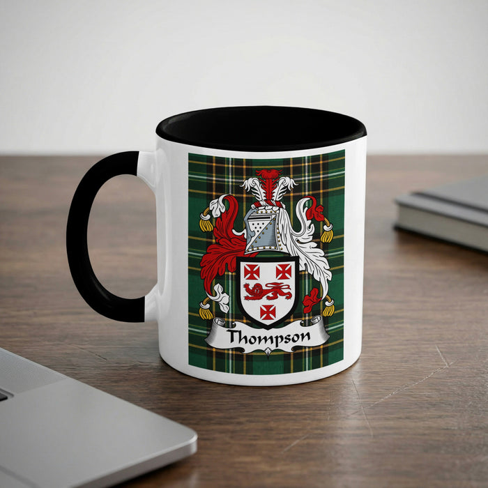 Thompson family crest emblem mug with black handle and interior