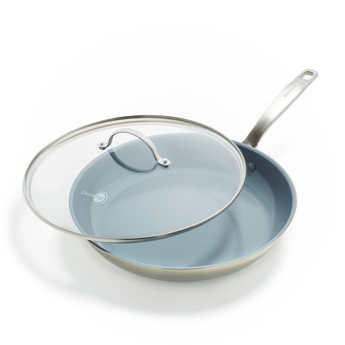 Ceramic nonstick frypan with glass lid on a white background.