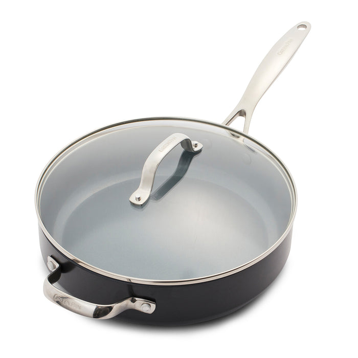 Gray ceramic nonstick sauté pan with stainless steel handles and glass lid, on a white background.