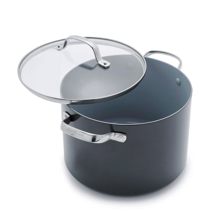 Gray ceramic nonstick 8-quart stockpot with lid slightly open, showing empty hard anodized aluminum interior.