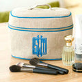 Ellis Hill Walton Handled Cosmetic Case, in linen or plastic-coated cotton, with monogram, 9 in. by 6.5 in.